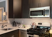 Thumbnail 2 of 20 - Fully Renovated Kitchens (in select units) at The Morgan Apartment Homes, North Bethesda