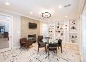 Thumbnail 14 of 19 - Living Area With Fireplace at Vivant Woodholme, Pikesville, MD, 21208