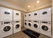 Thumbnail 14 of 42 - Renovated Laundry Room at Queen Anne Belvedere, Baltimore, Maryland