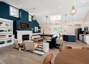 Thumbnail 23 of 35 - A modern kitchen with a dining table and chairs. at Spa Cove Apartments, Annapolis, 21403