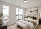 Thumbnail 5 of 40 - A bedroom with a large bed and a view of the city.