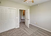 Thumbnail 36 of 61 - Bedroom with closet at Autumn Grove Apartments, Omaha