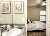Thumbnail 20 of 61 - Bathroom attached with bedroom at Autumn Grove Apartments, Omaha, NE 68135