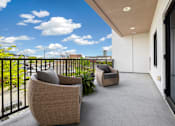 Thumbnail 14 of 52 - Upscale studio, one, and two-bedroom apartment homes featuring two-tone kitchen cabinetry, quartz countertops, stainless steel appliances, luxury vinyl wood flooring, and much more at Parkside Apartments and Shops in Bentonville, AR