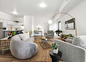 Thumbnail 9 of 52 - Upscale studio, one, and two-bedroom apartment homes featuring two-tone kitchen cabinetry, quartz countertops, stainless steel appliances, luxury vinyl wood flooring, and much more at Parkside Apartments and Shops in Bentonville, AR