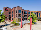 Thumbnail 16 of 35 - A red building with the words