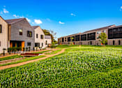Thumbnail 4 of 56 - Experience urban agrihood living at our one, two or three bedroom apartments and townhomes featuring amazing apartment and community amenities at Red Barn in Bentonville, AR
