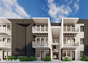 Thumbnail 52 of 64 - A modern apartment complex with balconies and a clear sky in the background.