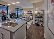 Thumbnail 21 of 21 - a kitchen with a sink and a view of a living room at 520 Lofts, Pennsylvania 18101