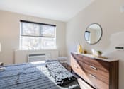 Thumbnail 3 of 14 - Bedroom with cozy bed at Walnut View Apartments, Allentown