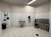 Thumbnail 22 of 26 - A clean, empty room with a sink and a trash can at The Hive Apartments, Allentown 18101