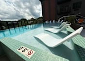 Thumbnail 20 of 22 - A pool with a sign that says 0'8" no diving.