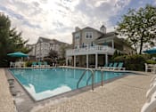 Thumbnail 9 of 28 - Swimming Pool And Relaxing Area at Saucon View Apartments, Bethlehem, PA