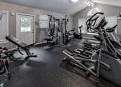 Thumbnail 10 of 26 - A gym with treadmills, elliptical machines, and other exercise equipment. at Meadows Apartments, Pennsylvania, 18049