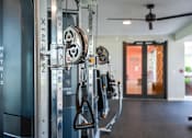 Thumbnail 58 of 58 - A gym with a row of exercise bikes.