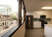 Thumbnail 1 of 38 - a kitchen with a window and a city view  at The Lady, South Carolina, 29201