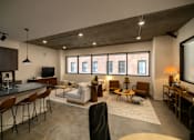 Thumbnail 4 of 38 - a living room with a kitchen and a large window  at The Lady, Columbia, SC, 29201