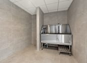 Thumbnail 13 of 20 - A stainless steel kitchen appliance is in a room with grey walls.