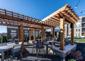Thumbnail 3 of 36 - Outdoor Grill With Intimate Seating Area at One Deerfield Apartments, Mason, OH, 45040
