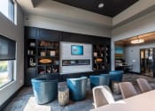 Thumbnail 5 of 36 - Clubroom With Fireplace And TV at One Deerfield Apartments, Mason, 45040