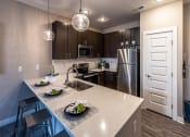 Thumbnail 26 of 36 - Island Kitchen at One Deerfield Apartments, Mason, 45040