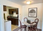Thumbnail 1 of 10 - Spacious dining room in East Lansing Apartments near Michigan State University | Stoneridge