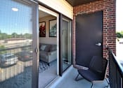 Thumbnail 24 of 36 - Balcony at Living room at Southfield MI Apartments | 42 West Apartments in Southfield Michigan