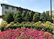 Thumbnail 25 of 36 - Exterior at Living room at Southfield MI Apartments | 42 West Apartments in Southfield Michigan