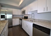 Thumbnail 12 of 36 - Kitchen at Living room at Southfield MI Apartments | 42 West Apartments in Southfield Michigan