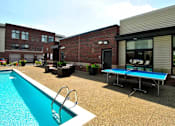 Thumbnail 36 of 36 - Swimming pool at Living room at Southfield MI Apartments | 42 West Apartments in Southfield Michigan