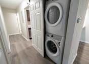 Thumbnail 5 of 23 - In unit washer and dryer at Alpine Slopes Apartments near Grand Rapids, MI