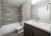 Thumbnail 9 of 23 - Bathroom at Alpine Slopes Apartments near Grand Rapids, MI