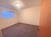 Thumbnail 4 of 7 - Lansing Apartments bedroom with carpet