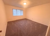 Thumbnail 3 of 7 - Lansing Apartments bedroom with carpet