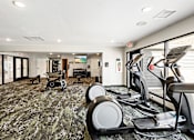 Thumbnail 11 of 20 - Fitness studio  at Arbor Glen Apartments in East Lansing, MI near Michigan State University.