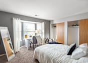 Thumbnail 4 of 20 - Bedroom at Arbor Glen Apartments in East Lansing, MI near Michigan State University.