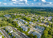 Thumbnail 18 of 20 - an aerial view of a neighborhood with houses and trees
