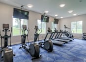 Thumbnail 32 of 47 - Gym in apartments in Traverse City | Bayview of Traverse City