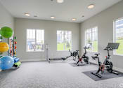 Thumbnail 34 of 47 - Gym in apartments in Traverse City | Bayview of Traverse City