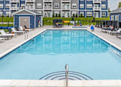 Thumbnail 37 of 47 - Pool, hot tub and pool deck at apartments in Traverse City | Bayview of Traverse City