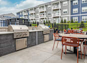 Thumbnail 38 of 47 - Pool, hot tub and pool deck at apartments in Traverse City | Bayview of Traverse City