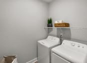 Thumbnail 16 of 47 - Washer dryer in apartments in Traverse City | Bayview of Traverse City