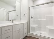 Thumbnail 12 of 47 - Bathroom with shower in apartments in Traverse City | Bayview of Traverse City