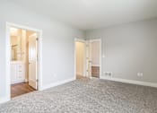 Thumbnail 10 of 47 - Bedroom with ensuite bath in apartments in Traverse City | Bayview of Traverse City