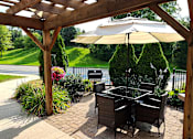 Thumbnail 22 of 27 - Grill area at Briarlane Apartments in Grand Rapids, MI