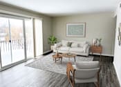 Thumbnail 2 of 27 - Living room at Briarlane Apartments in Grand Rapids, MI