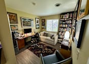 Thumbnail 11 of 27 - Living room at Briarlane Apartments in Grand Rapids, MI
