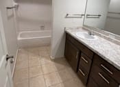 Thumbnail 8 of 27 - Bathroom at Briarlane Apartments in Grand Rapids, MI