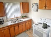 Thumbnail 2 of 9 - Spacious kitchen in East Lansing Apartments near Michigan State University | Brookport