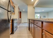 Thumbnail 4 of 24 - Kitchen in East Lansing Apartment near MSU | Delta Arms Apartments